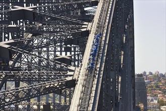 People walking on Sydney Harbor Bridge