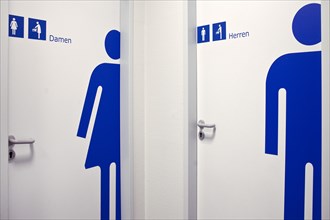 Two doors to toilets for women or men