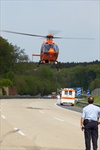 Rescue helicopter in action on the A3 motorway near Dierdorf