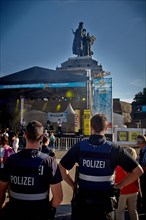 Police guarding open air concert