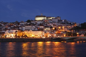 Historic centre with University and Mondego River at dusk