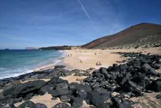 Playa de las Conchas and Volcano Montana Bermeja in the North