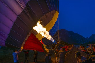 Hot air balloon being inflated with fire