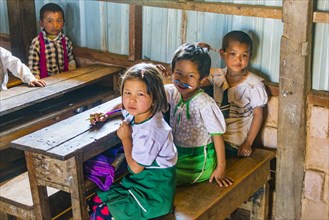 School children sitting at their desks