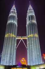 Lit Petronas Towers at night