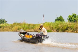 Local man steers motorboat