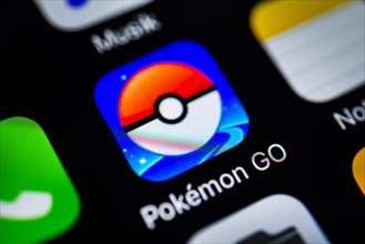 Smartphone screen with Pokemon Go app icon in detail