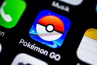 Smartphone screen with Pokemon Go app icon in detail