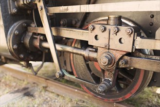 Close up of wheel on old steam train locomotive
