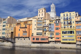 Colorful houses and Cathedral on the Onyar River