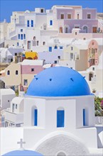 Orthodox church and colorful houses
