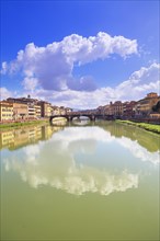 Arno river with bridges Ponte Santa Trinita and Ponte Vecchio