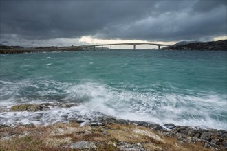 Bad weather and stormy sea with car bridge to Sommaroy