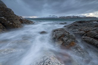 Dark clouds over the stormy sea