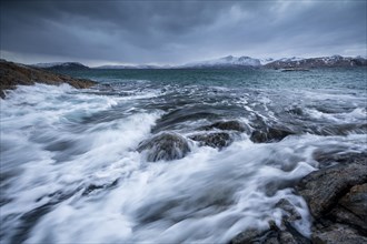 Dark clouds over the stormy sea