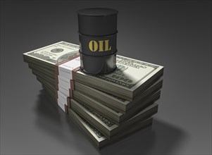 Oil barrel standing on stack of dollar bills