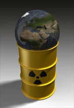 Globe on top of nuclear waste barrel