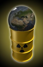 Globe lying on barrel with nuclear waste