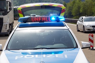 Illuminated sign Accident on a motorway police patrol car on the highway