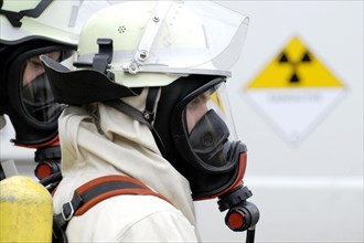 Firefighters with radiation protection
