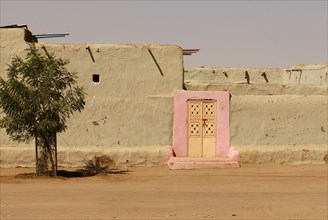Pink door in village near Kerma