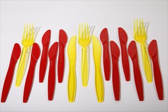 Red and yellow plastic cutlery
