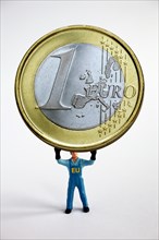 Man holds euro up