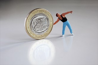 Discus thrower with Greek euro coin
