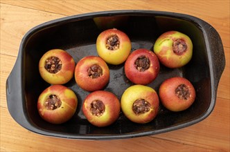 Prepared oven-ready baked apples in Reine