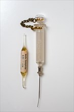 Historical syringe with ampoule