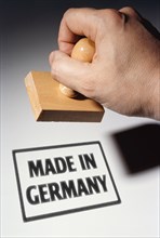 Hand with stamp Made in Germany