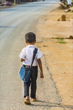 Little boy on way to school