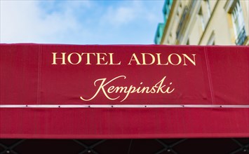 Awning at the entrance with inscription Hotel Adlon Kempinsky
