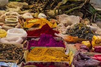 Colorful spices and goods at a market