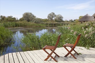 Two chairs on viewing platform at the lagoon