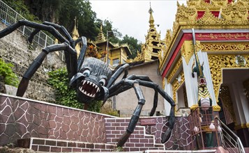 Figure of a giant spider at the entrance to Pindaya Cave