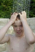 Boy having a shower