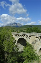 Old bridge over the river Golo