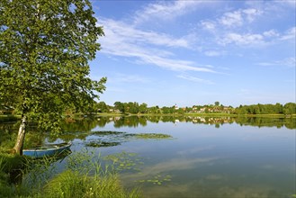 Bad Bayersoien and St. Georg parish church across Bayersoiener lake