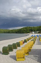 Colourful beach chairs on the sandy beach of the Baltic Sea