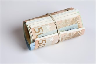 Roll of money with rubber band