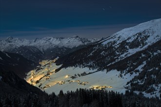 Illuminated mountain village