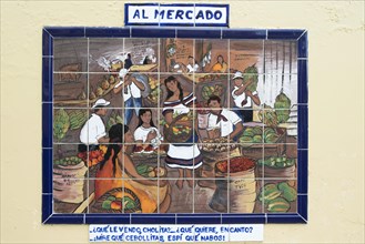 Tile painting of a market scene