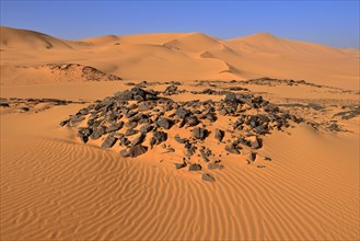 Tumulus burial mound in the sanddunes of Oued In Djerane