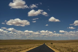 Road with cloudy sky
