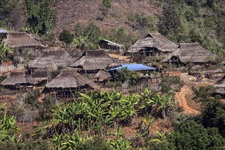 Typical thatched huts in a mountain village of the Ann tribe