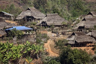 Typical thatched huts in a mountain village of the Ann tribe