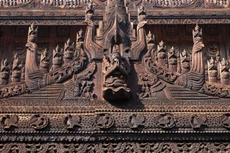 Carvings on the wooden facade