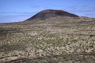 Barren landscape and volcanic mountain Arena in Villaverde