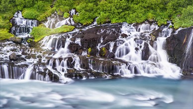 Hraunfossar Waterfalls with river Hvita